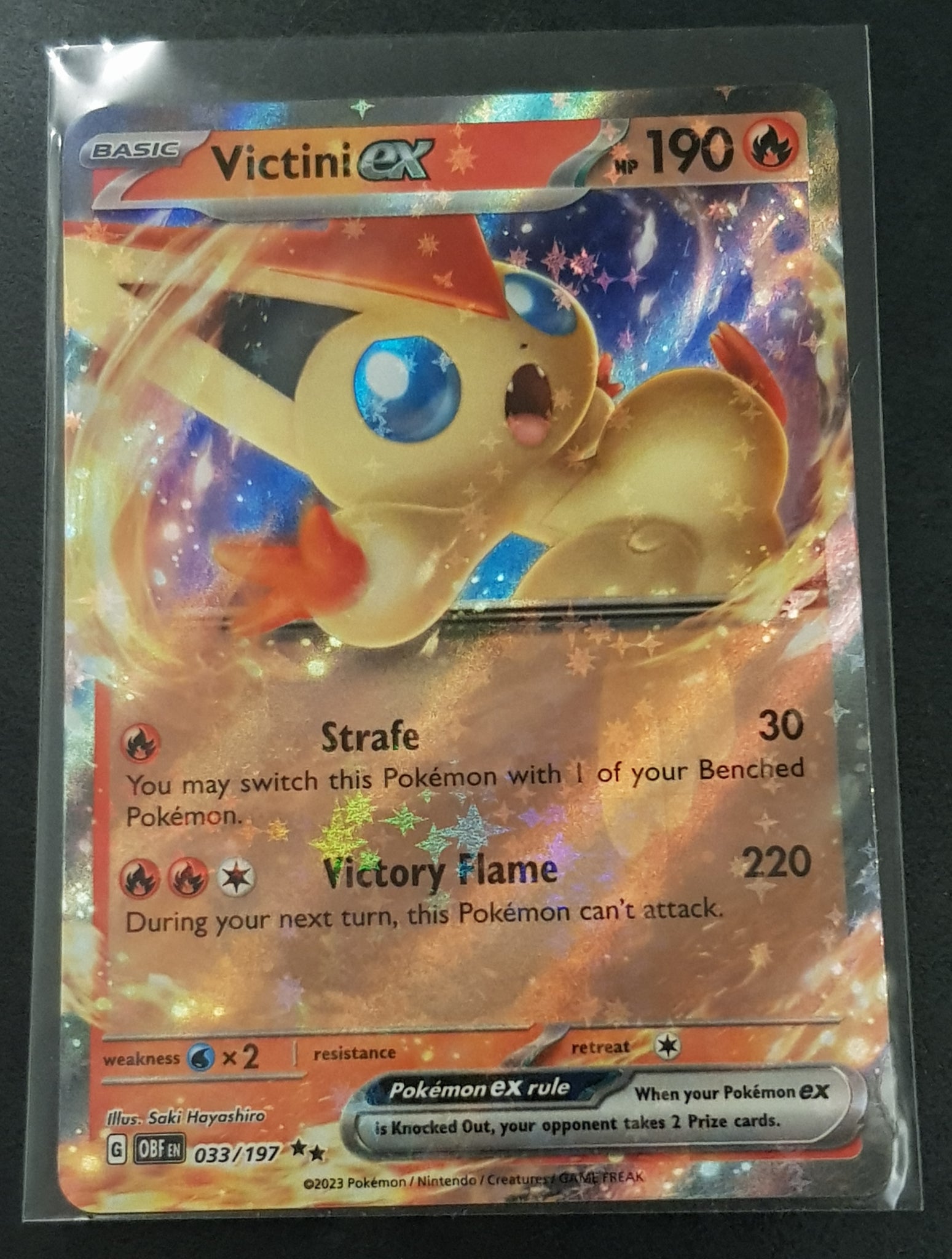 Pokemon Scarlet and Violet Obsidian Flames Victini Ex #033/197 Holo Tr – Rotterdam Comics