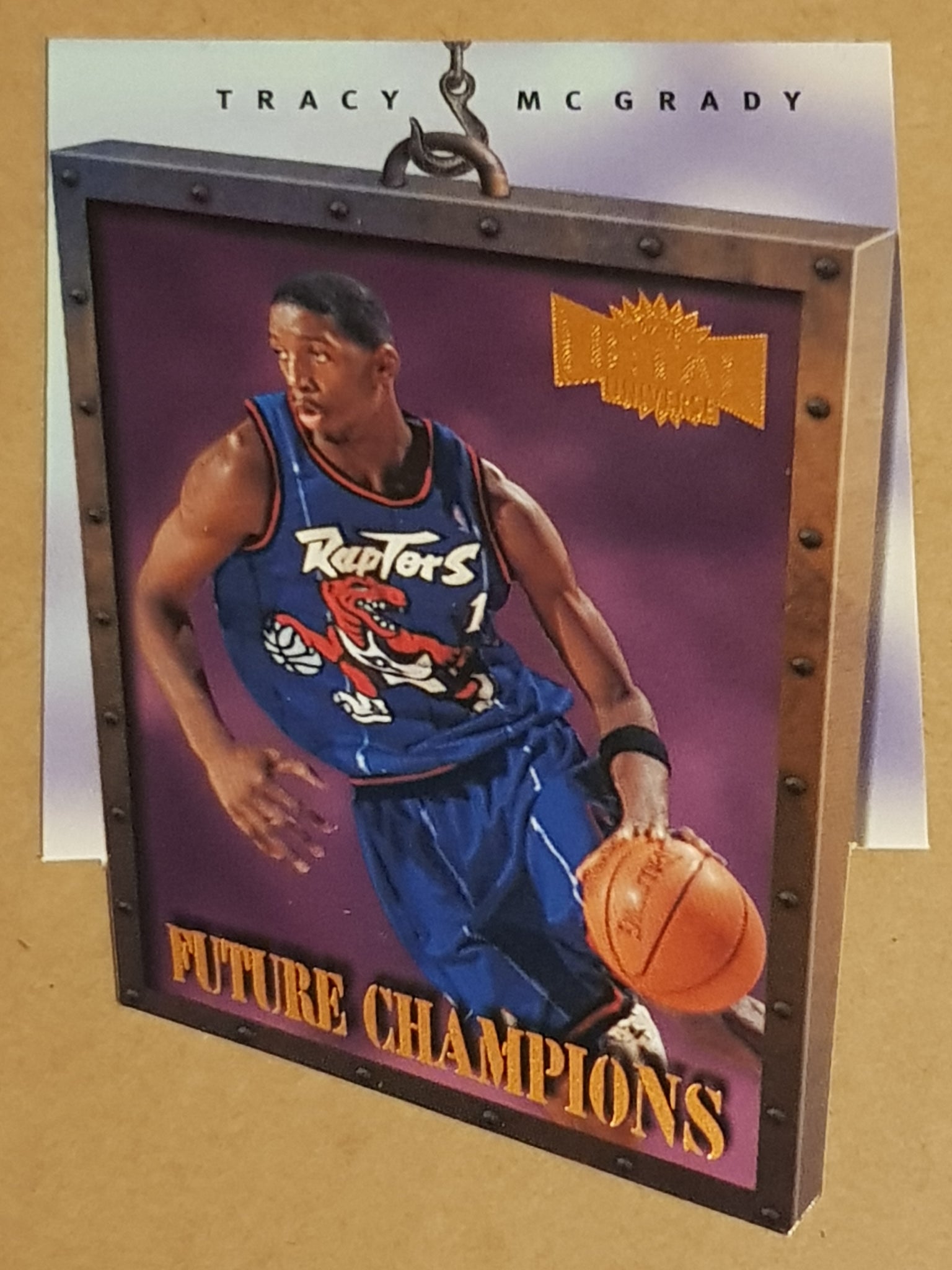 1997-98 Fleer Metal Universe Basketball Future Champions Tracy McGrady #7 Die-Cut Rookie Card Insert