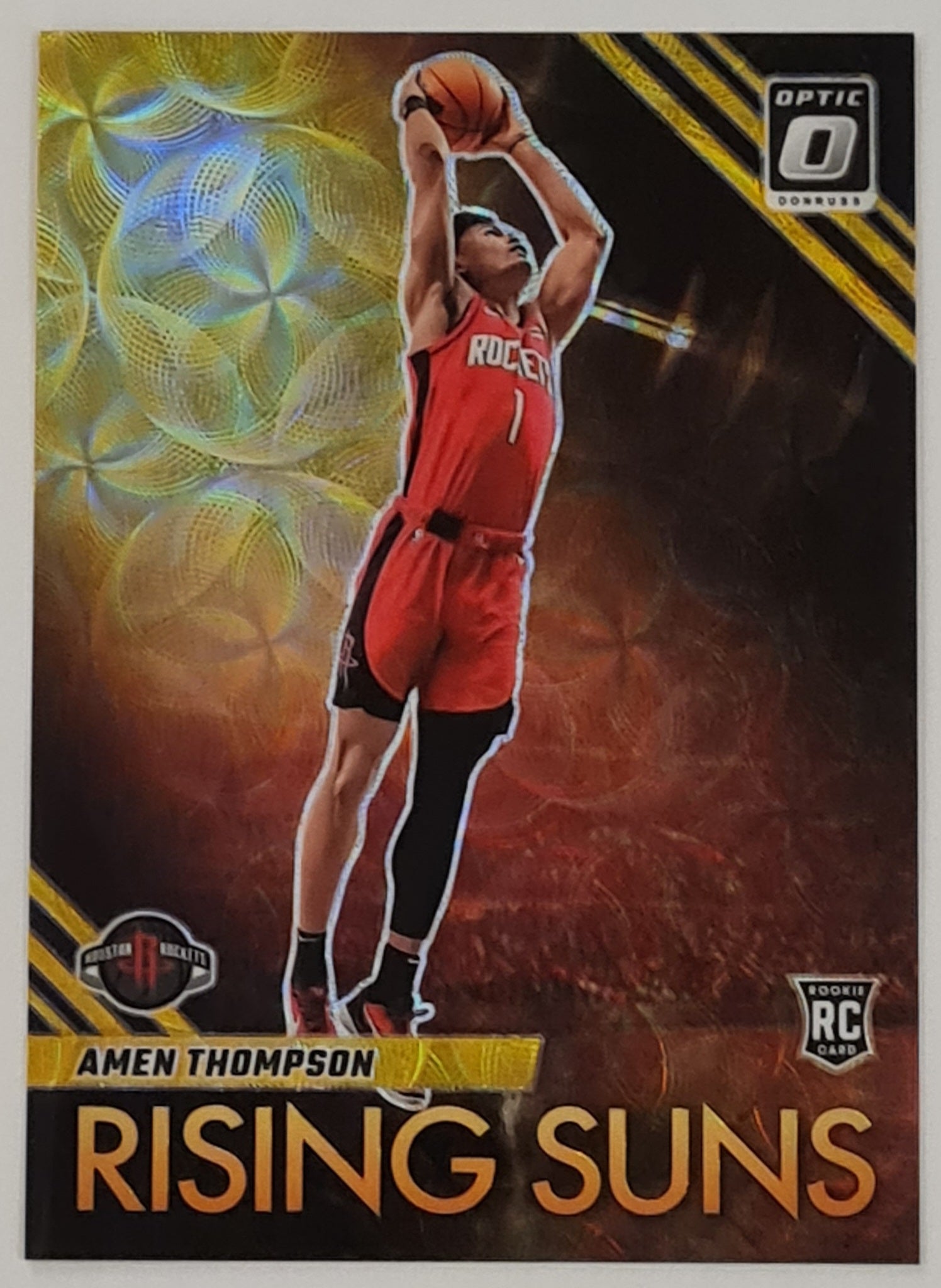 2023-24 Panini Donruss Optic Basketball Rising Suns Amen Thompson #15 Gold International Prizm Parallel /10 Rookie Card