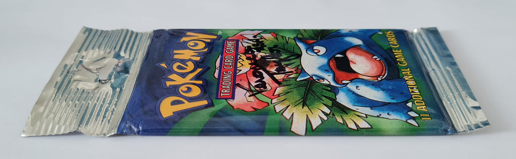 pokemon base set booster pack long crimp 1999 Pokemon Base Set Unlimited 'Long Crimp' Booster Pack PSA/DNA Cert – Rotterdam Comics