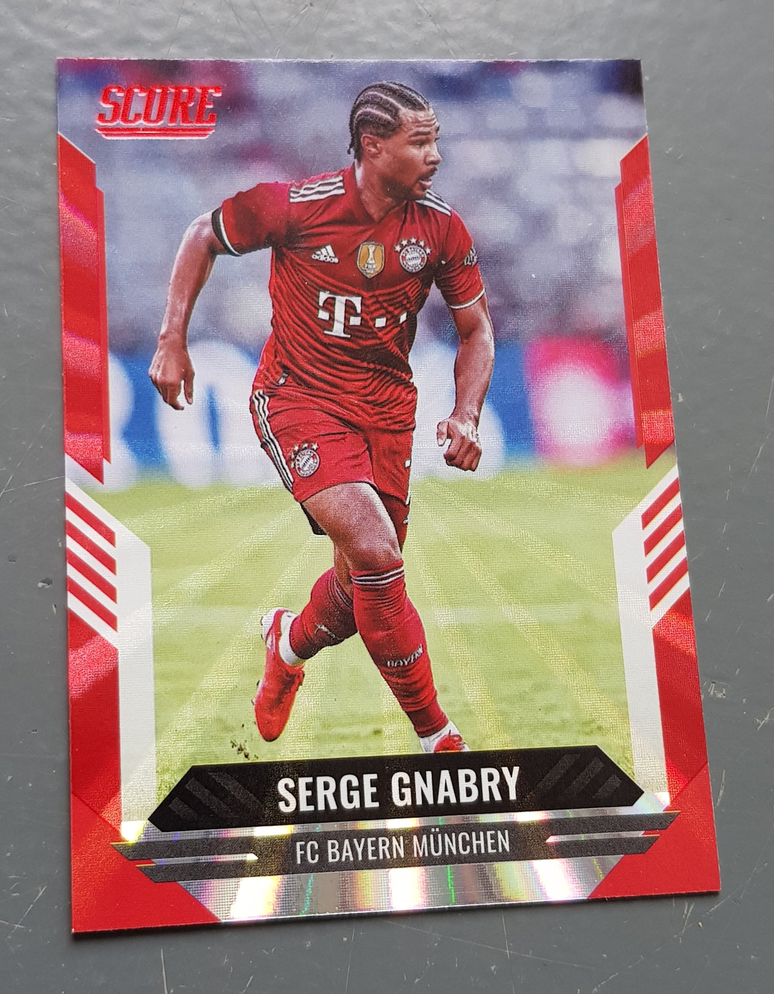 2021-22 Panini Score FIFA Serge Gnabry #175 Red Laser Parallel Trading Card