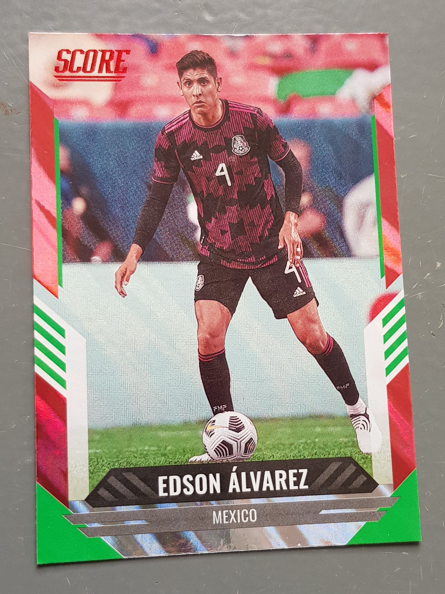 2021-22 Panini Score FIFA Edson Álvarez #13 Red Lava Parallel Trading Card