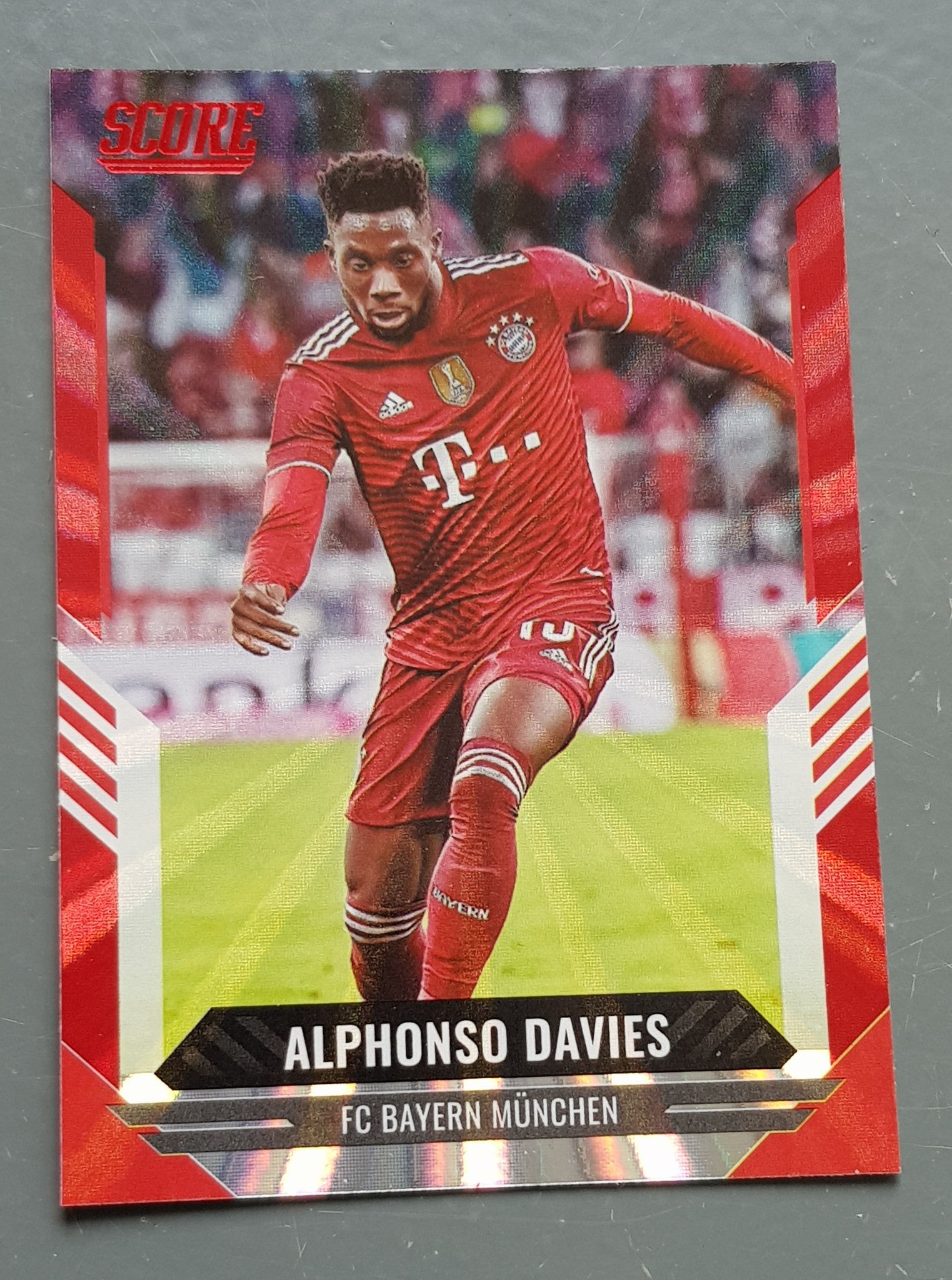 2021-22 Panini Score FIFA Alphonso Davies #174 Red Laser Parallel Trading Card