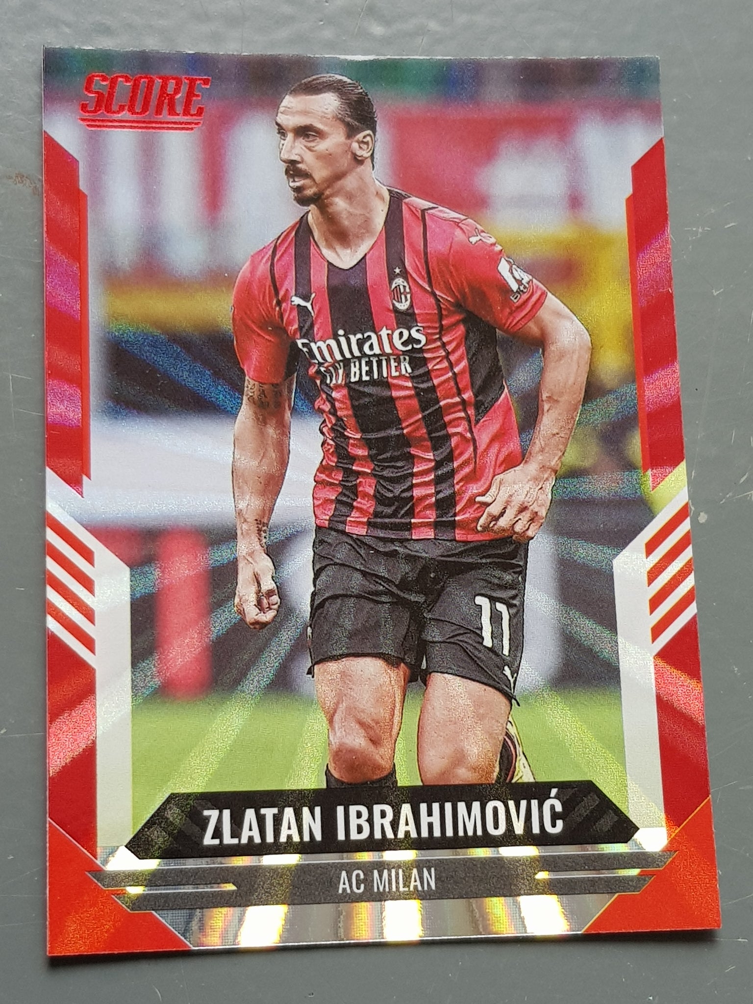2021-22 Panini Score FIFA Zlatan Ibrahimovic #104 Red Laser Parallel Trading Card