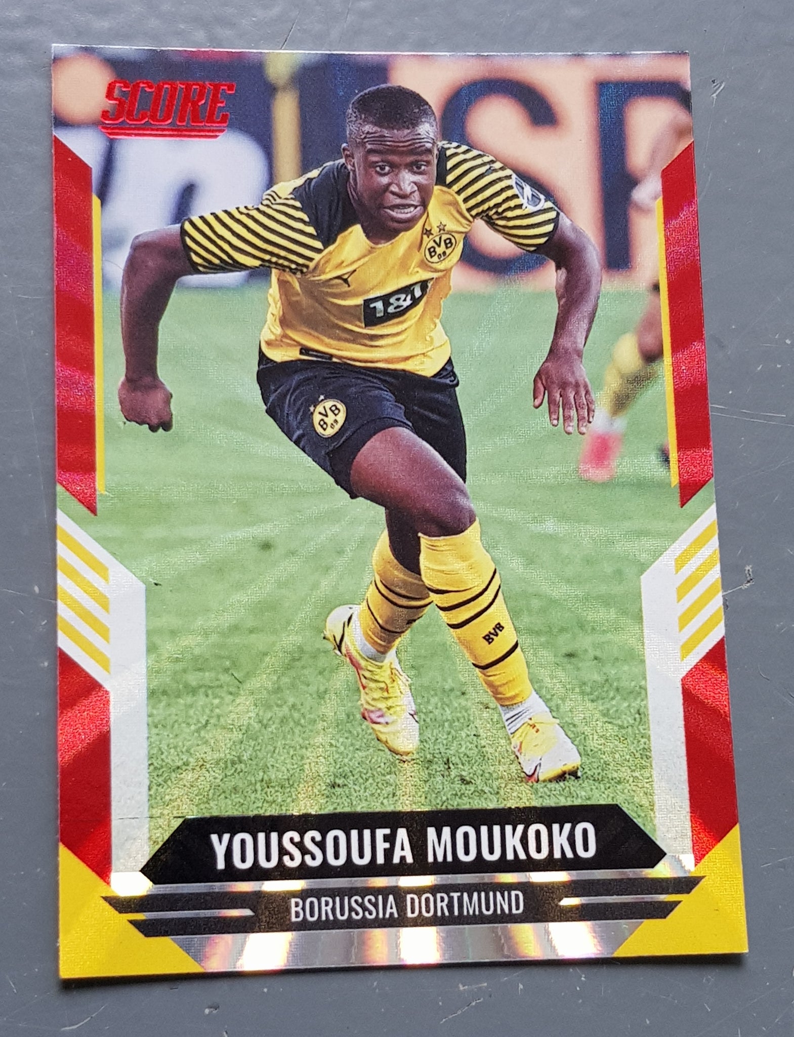 2021-22 Panini Score FIFA Youssoufa Moukoko #123 Red Laser Parallel Trading Card