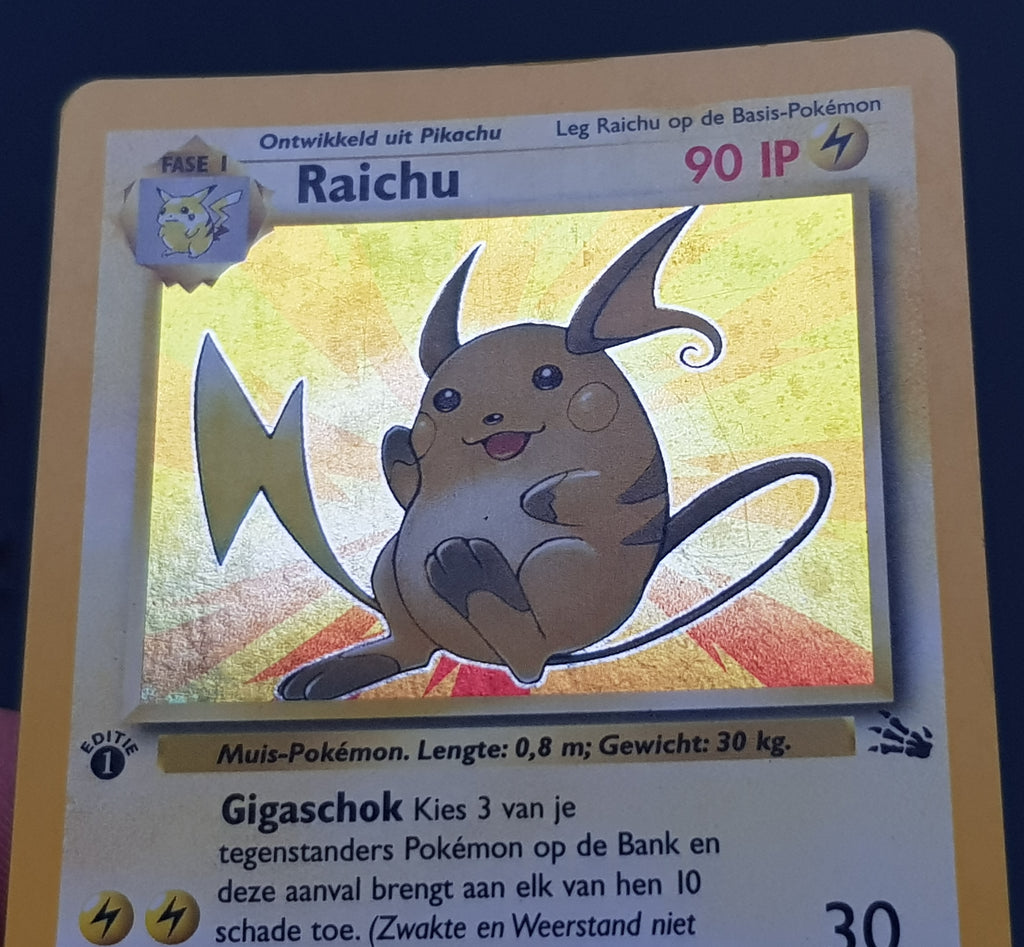 Pokemon Dutch Fossil Raichu (1st edition) #14/62 Foil Trading Card – Rotterdam Comics