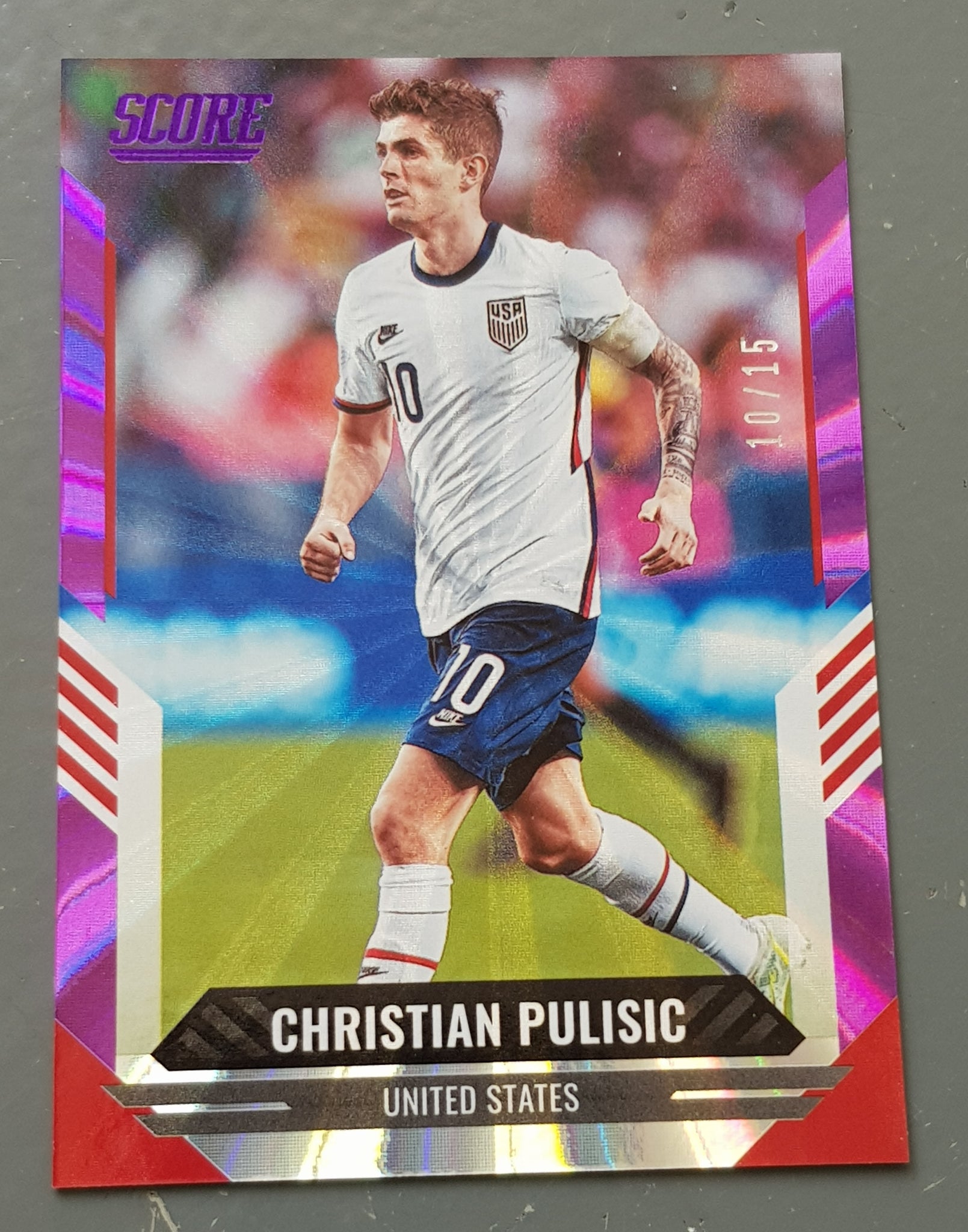 2021-22 Panini Score FIFA Christian Pulisic #44 Purple Laser Parallel /15 Trading Card (Jersey Numbered #10/15)