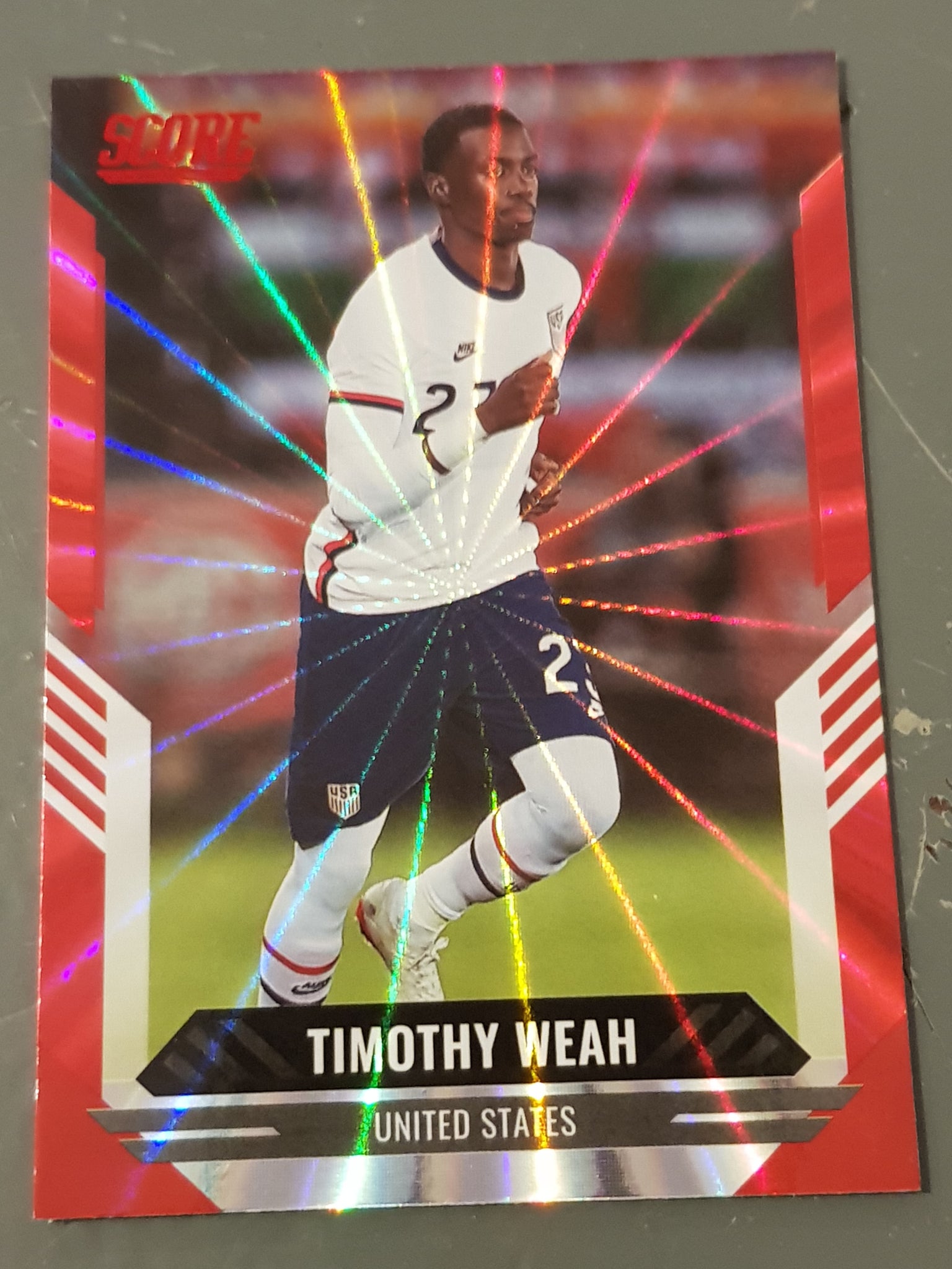 2021-22 Panini Score FIFA Timothy Weah #47 Red Laser Parallel Trading Card