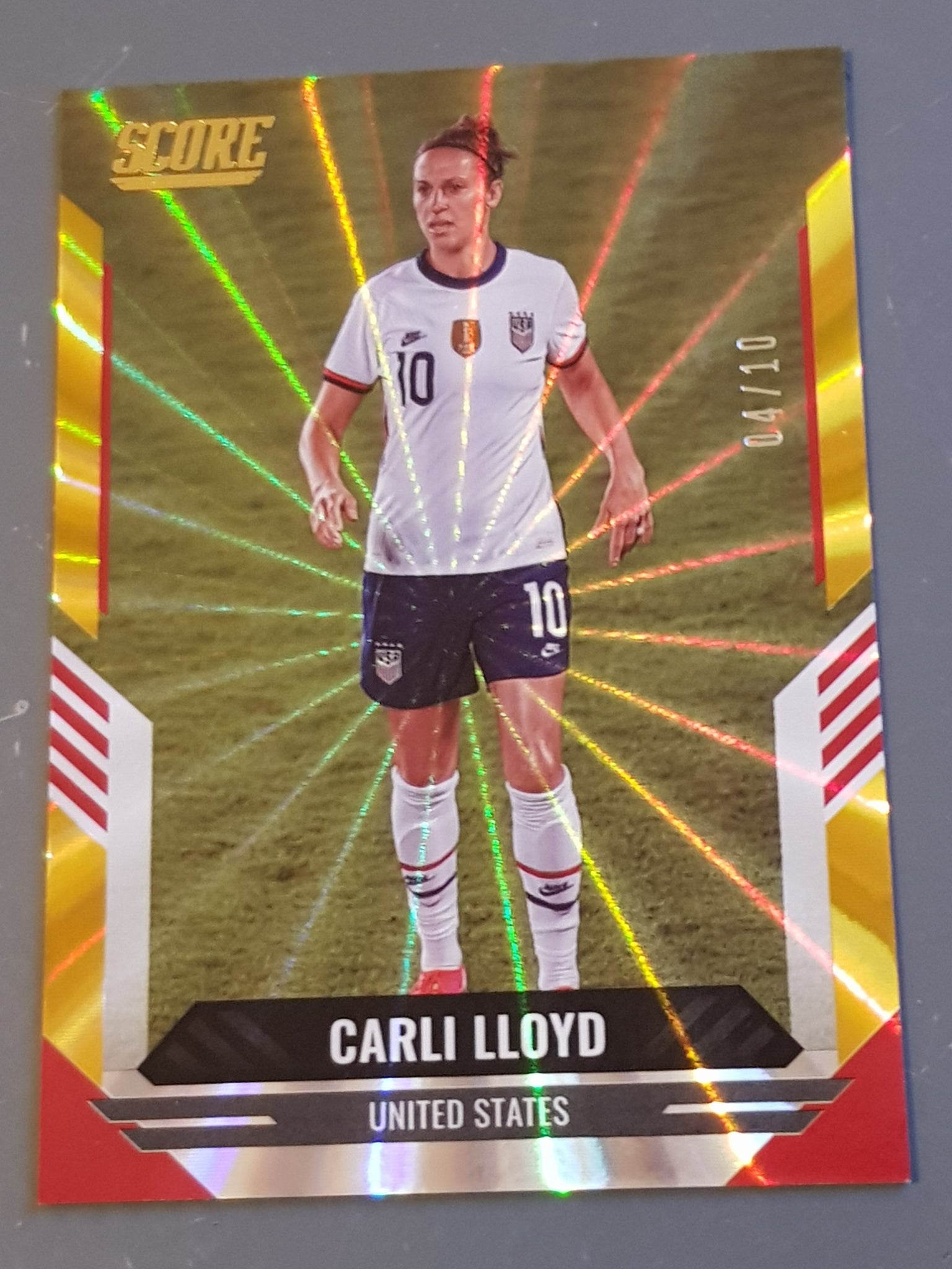 2021-22 Panini Score FIFA Carli Lloyd #50 Gold Laser Parallel /10 Trading Card