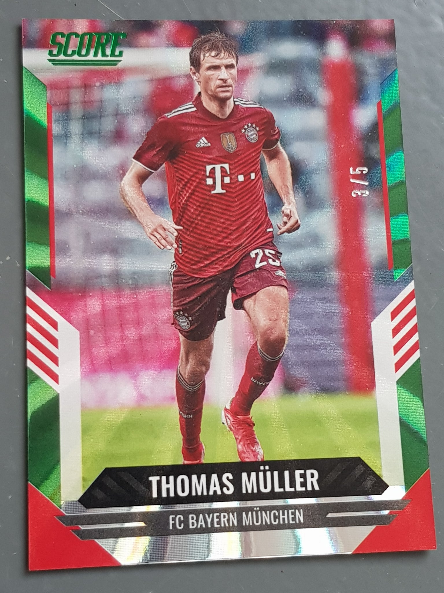 2021-22 Panini Score FIFA Thomas Müller #177 Green Laser Parallel /5 Trading Card