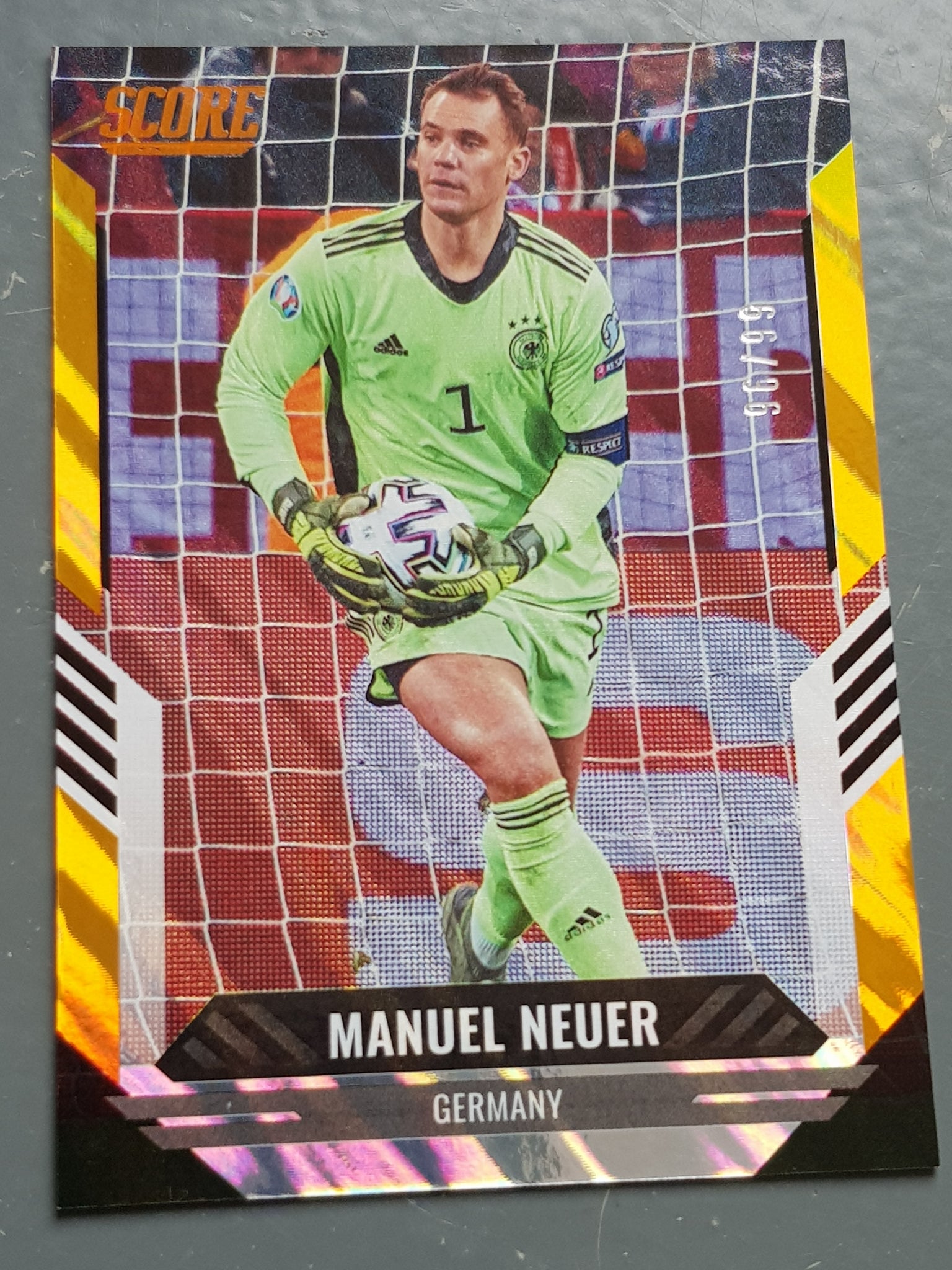 2021-22 Panini Score FIFA Manuel Neuer #32 Orange Lava Parallel /99 Trading Card