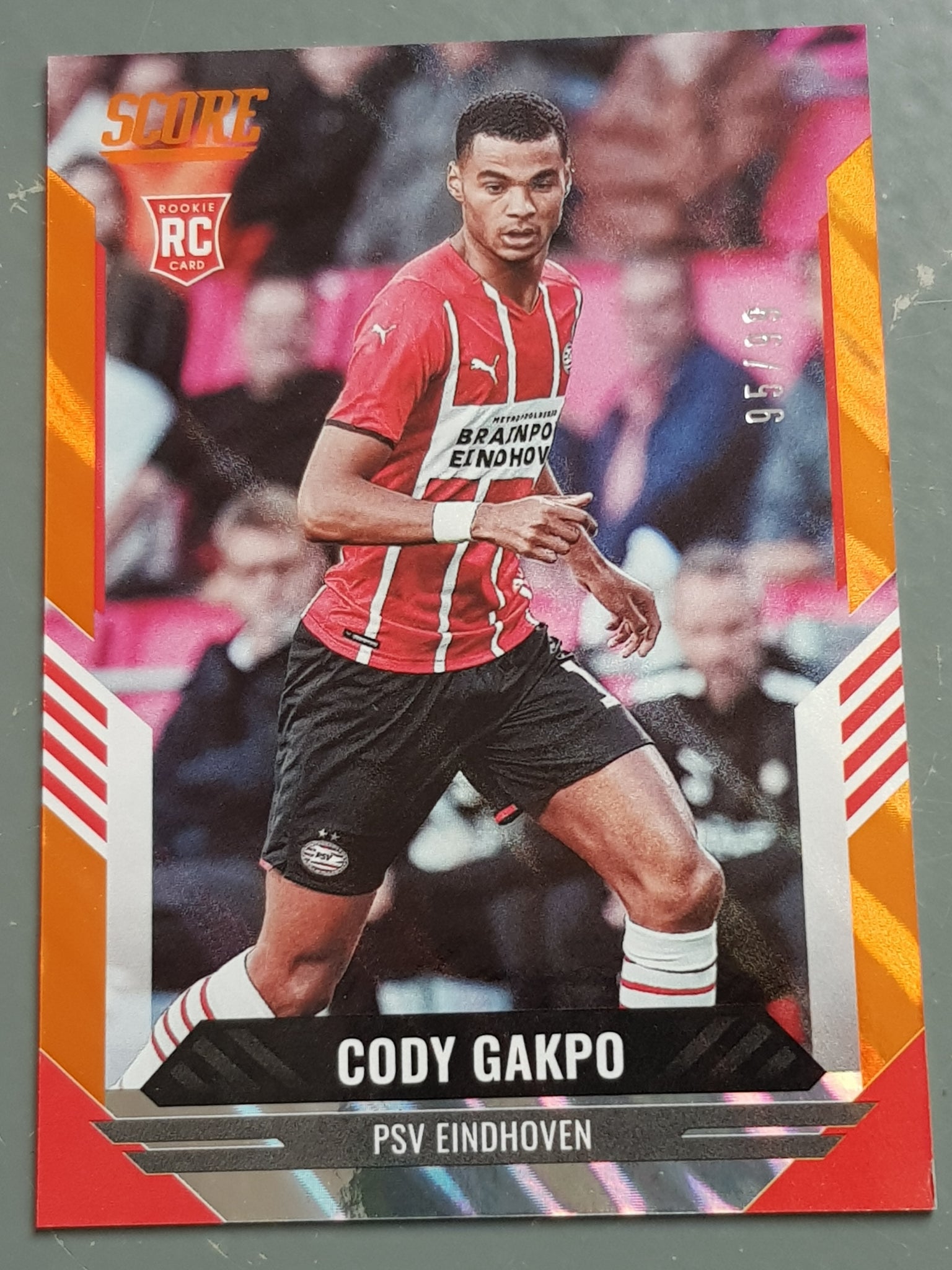 2021-22 Panini Score FIFA Cody Gakpo #195 Orange Lava Parallel /99 Rookie Card