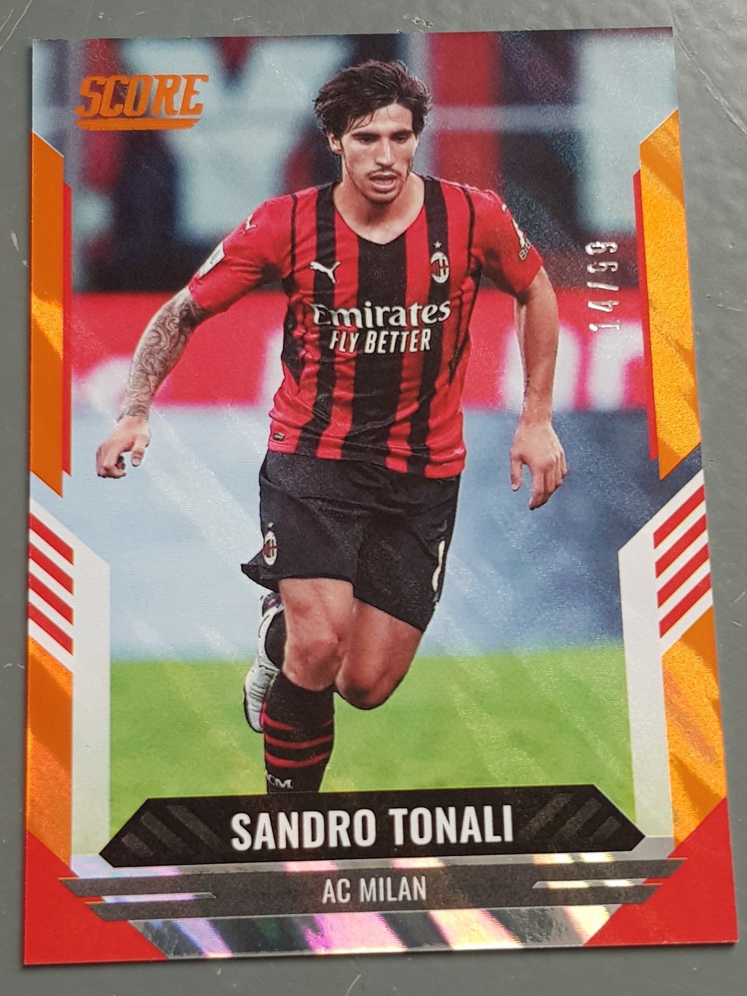 2021-22 Panini Score FIFA Sandro Tonali #105 Orange Lava Parallel /99 Trading Card