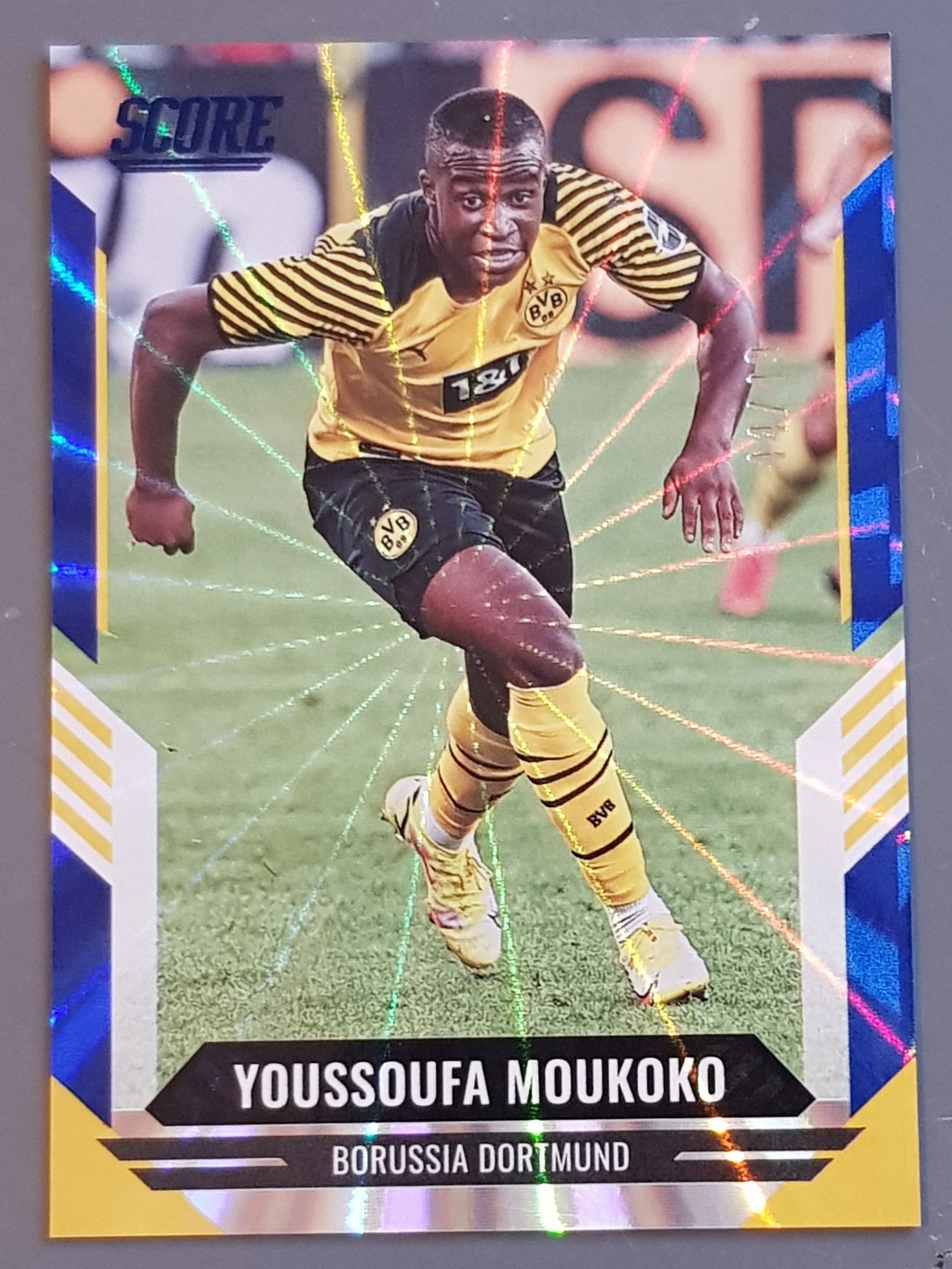 2021-22 Panini Score FIFA Youssoufa Moukoko #128 Blue Laser Parallel /49 Trading Card