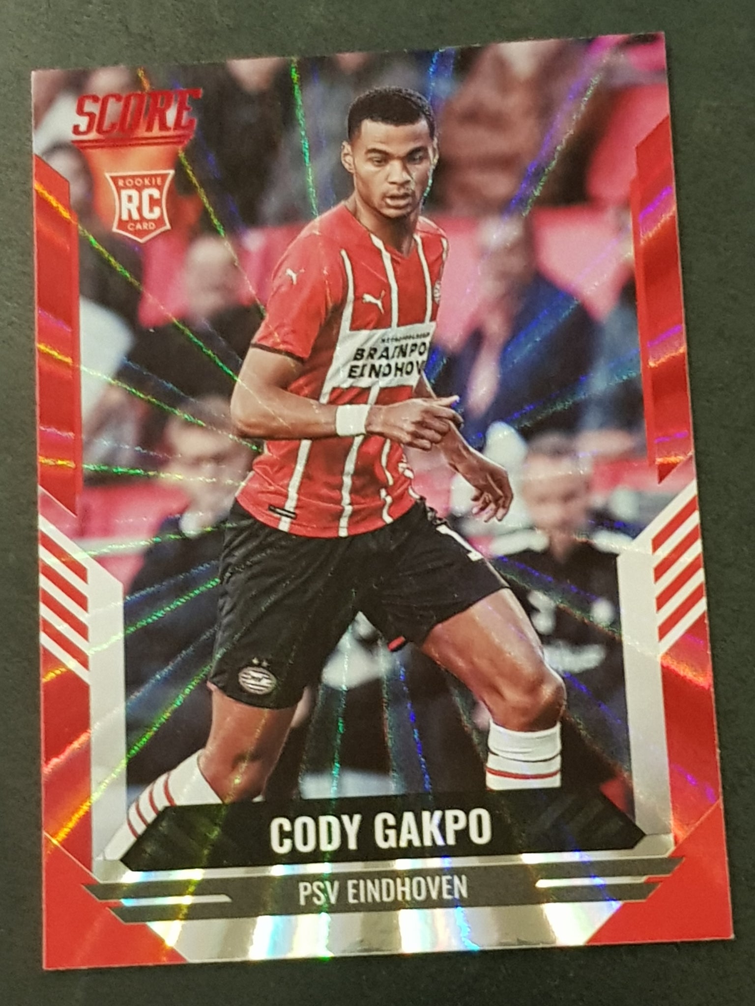 2021-22 Panini Score FIFA Cody Gakpo #195 Red Laser Parallel Rookie Card