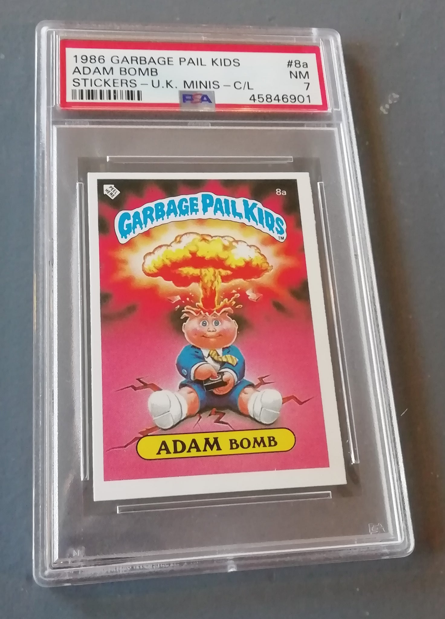 Garbage Pail Kids UK Series 1 #8a - Adam Bomb PSA 7 Sticker